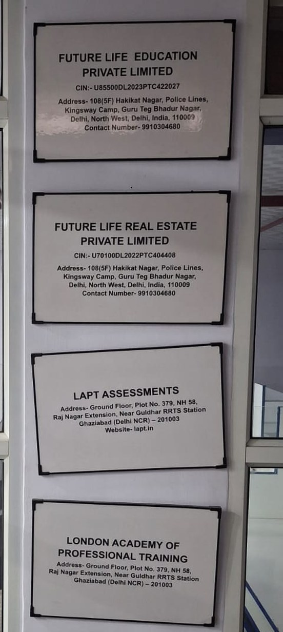 Nameplates at the Delhi office listing Future Life Real Estate Private Limited, Future Life Education Private Limited, LAPT Assessments and London Academy of Professional Training